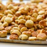 These crispy, savory homemade biscuits are packed with smoky bacon, salty parmesan, and briny olives. One bowl, no mixer, and on the table in under 30 minutes.