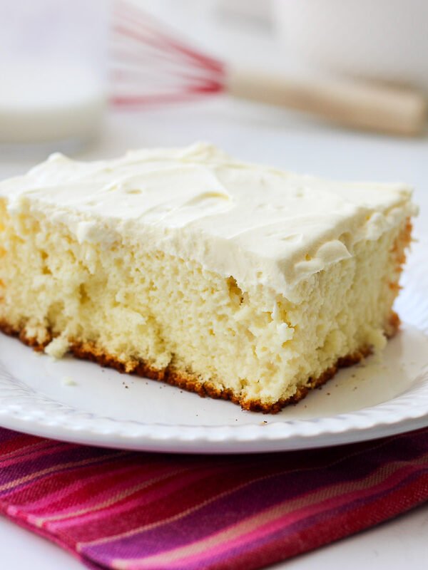 A feather-light 3-ingredient sponge soaked in sweetened condensed milk, evaporated milk, and whole milk, topped with pillowy homemade whipped cream. Simple, budget-friendly, and absolutely the cake your family will ask for every time.